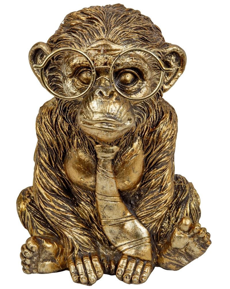 Singe drôle en or avec de grosses lunettes